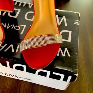 Red velvet high heels.